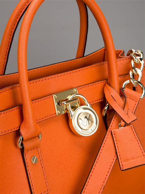 michael kors fringe purse|michael kors orange handbag.